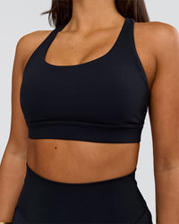 Woman wearing Flow Sports Bra - Black | Model:Bianca | Size:S | Thumbnail Index: 2
