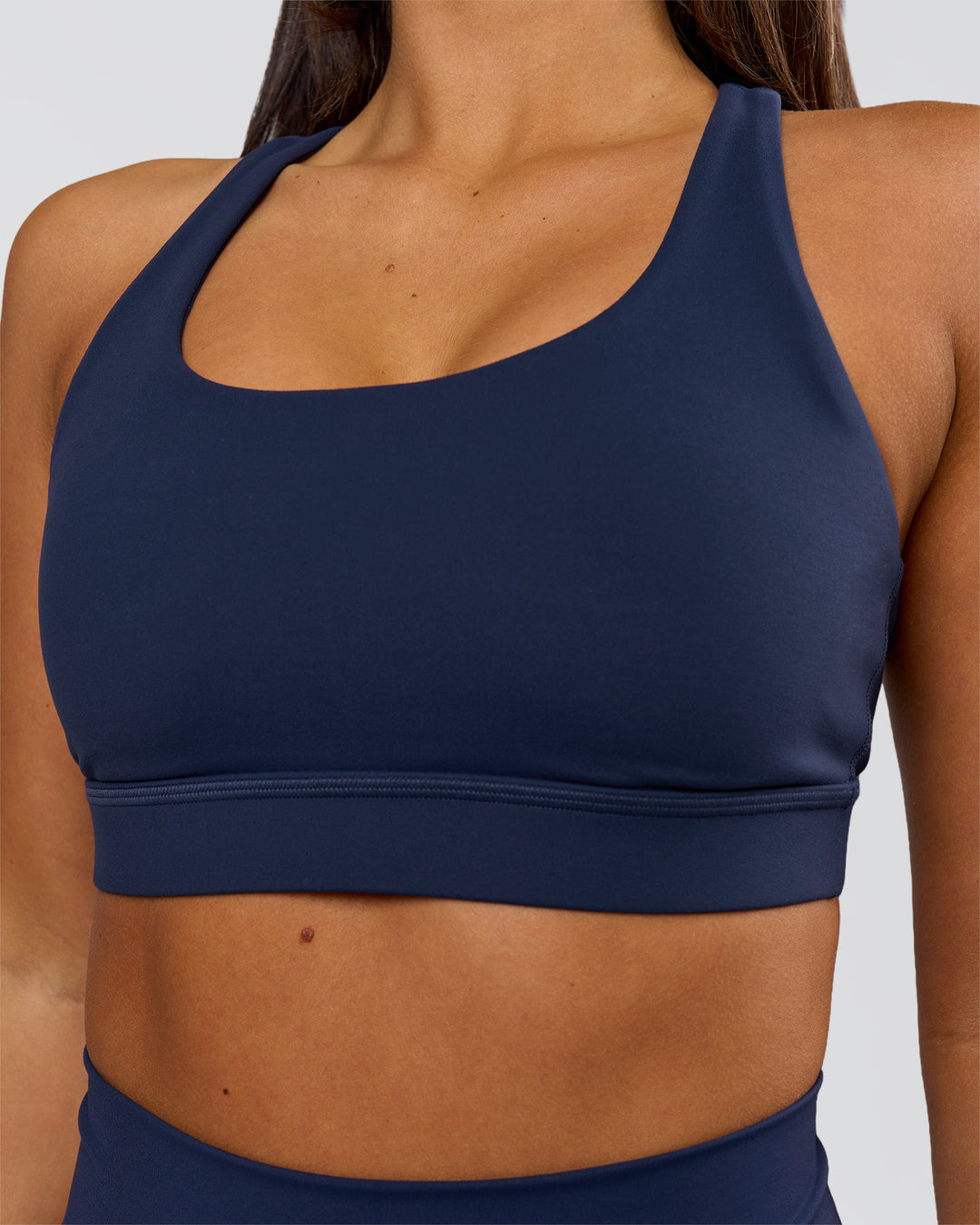 Woman wearing Flow Sports Bra - Future Navy | Model:Bianca | Size:S - view 5