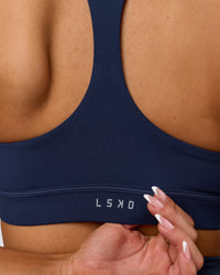 Woman wearing Flow Sports Bra - Future Navy | Model:Bianca | Size:S | Thumbnail Index: 6