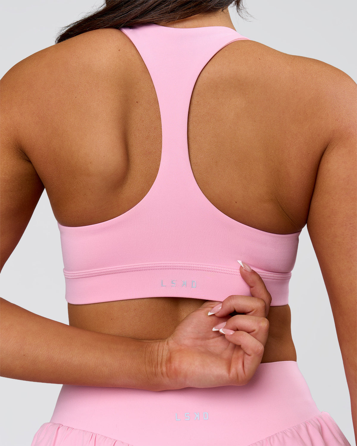 Woman wearing Flow Sports Bra - Pink Rose | Model:Bianca | Size:S