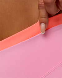 Woman wearing Fusion Contrast V-Waist High-Rise 4" Short Pockets - Pink Rose-Hyper Orange | Model:Bianca | Size:S | Thumbnail Index: 8
