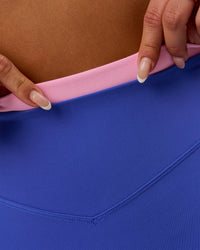 Woman wearing Fusion Contrast V-Waist High-Rise 6" Short Pockets - Power Cobalt-Pink Rose | Model:Bianca | Size:S | Thumbnail Index: 2