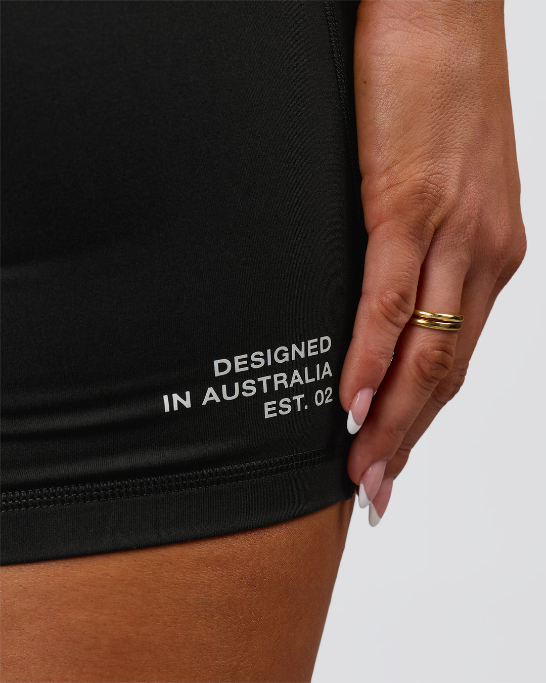 Woman wearing Fusion V-Contour High-Rise 6" Short Pockets - Black-Tech Department | Model:Bianca | Size:S - view 9
