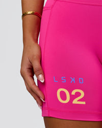 Woman wearing Fusion V-Contour High-Rise 6" Short Pockets - Ultra Pink-Tech Department | Model:Bianca | Size:S | Thumbnail Index: 7