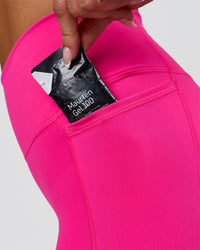 Woman wearing Fusion V-Contour High-Rise 6" Short Pockets - Ultra Pink-Tech Department | Model:Bianca | Size:S | Thumbnail Index: 11
