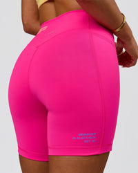 Woman wearing Fusion V-Contour High-Rise 6" Short Pockets - Ultra Pink-Tech Department | Model:Bianca | Size:S | Thumbnail Index: 15