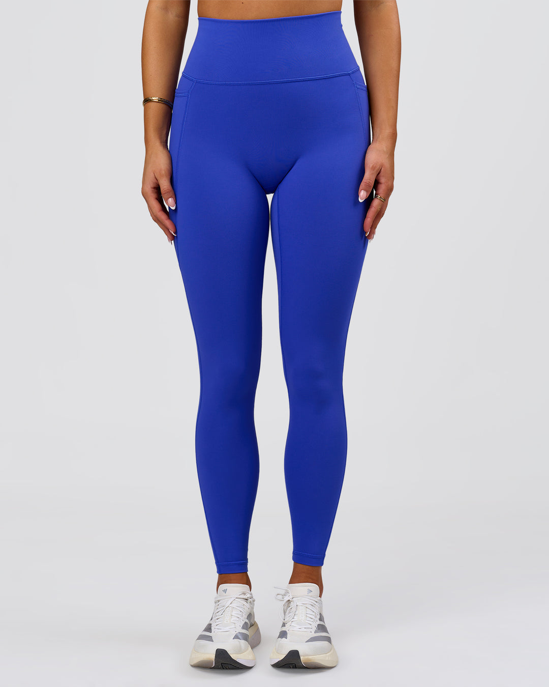 Woman wearing Fusion V-Contour Ultra High-Rise Full Length Legging Pockets - Power Cobalt | Model:Bianca | Size:S - view 1
