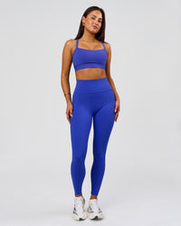Woman wearing Fusion V-Contour Ultra High-Rise Full Length Legging Pockets - Power Cobalt | Model:Bianca | Size:S | Thumbnail Index: 2