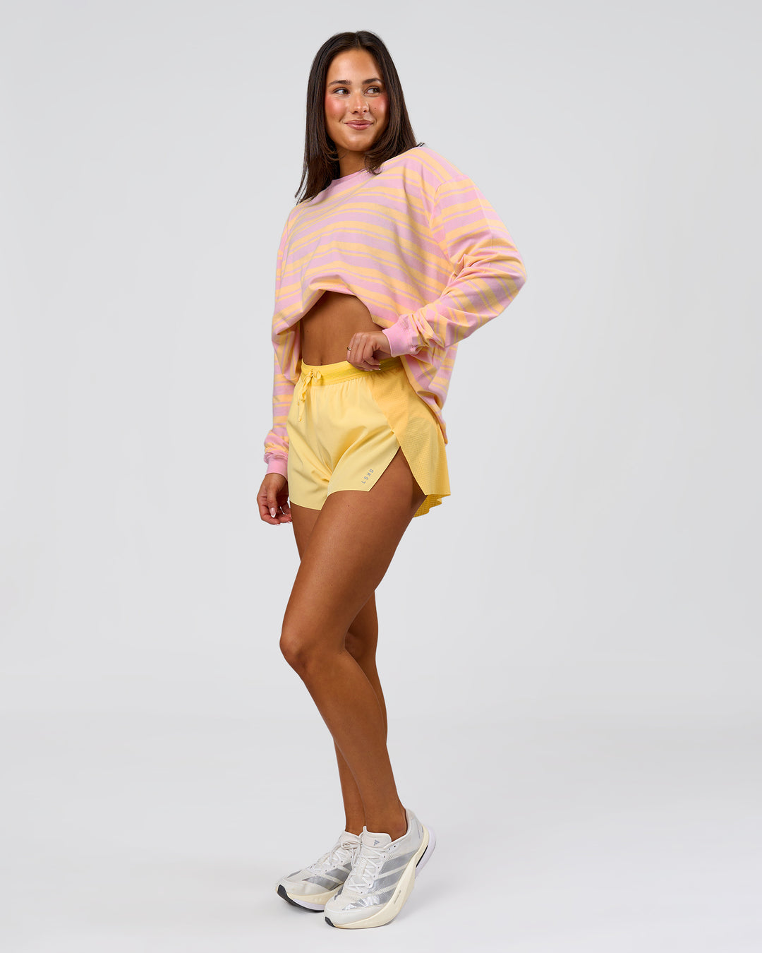 Woman wearing Go-To Shadow Stripe Long Sleeve FLXCotton Oversized Tee - Lemon-Marshmallow | Model:Bianca | Size:S - view 6