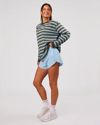 Woman wearing Go-To Shadow Stripe Long Sleeve FLXCotton Oversized Tee - Pure Olive-Open Air | Model:Bianca | Size:S | Thumbnail Index: 4
