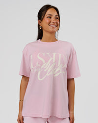 Woman wearing LSKD Fitness Club Heavyweight Oversized Tee - Marshmallow-Off White | Model:Bianca | Size:S | Thumbnail Index: 0