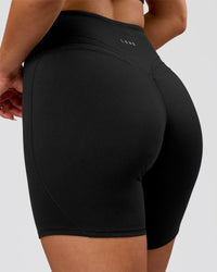 Woman wearing Luxe V-Contour High-Rise 6" Short - Black | Model:Bianca | Size:S | Thumbnail Index: 1