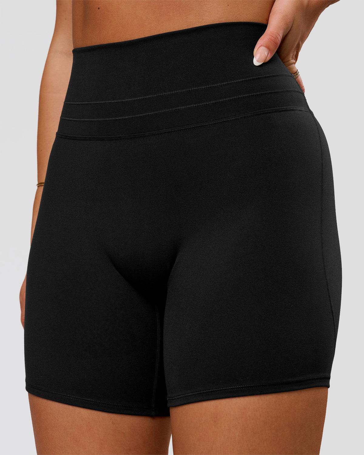 Woman wearing Luxe V-Contour High-Rise 6" Short - Black | Model:Bianca | Size:S - view 1
