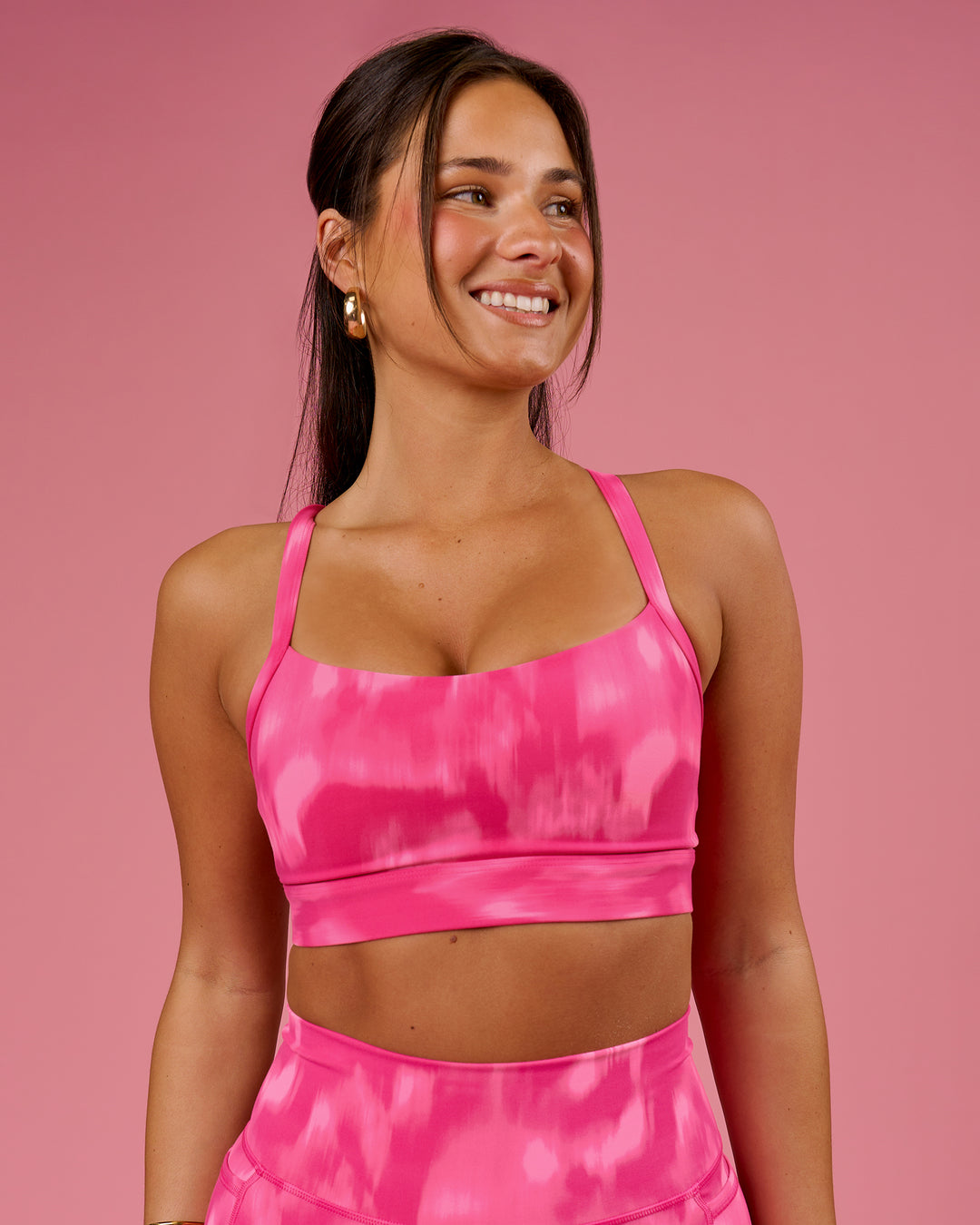Woman wearing Momentum Sports Bra D/DD/E - Radiant Pink | Model:Bianca | Size:S - view 1