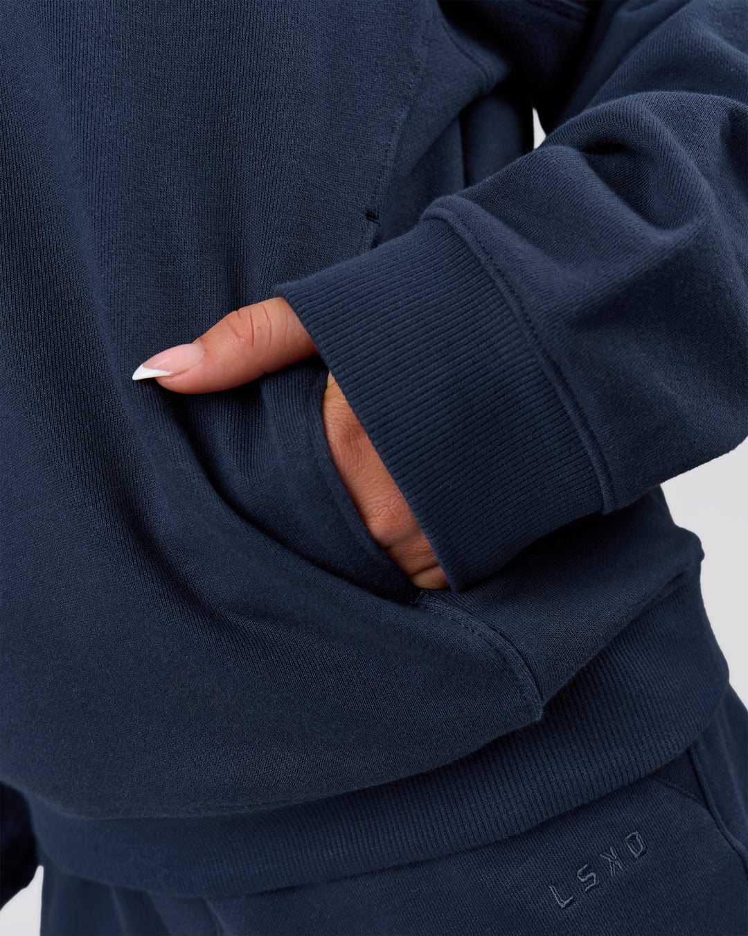 Woman wearing MVP Elite French Terry Hoodie - Future Navy | Model:Bianca | Size:S - view 16