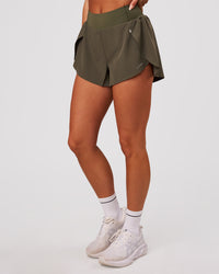 Woman wearing Pacer 3" Run Short - Pure Olive | Model:Bianca | Size:S | Thumbnail Index: 2