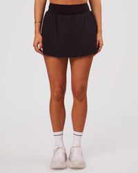 Woman wearing Pacer Skirt - Black | Model:Bianca | Size:S | Thumbnail Index: 6