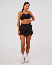 Woman wearing Pacer Skirt - Black | Model:Bianca | Size:S | Thumbnail Index: 8