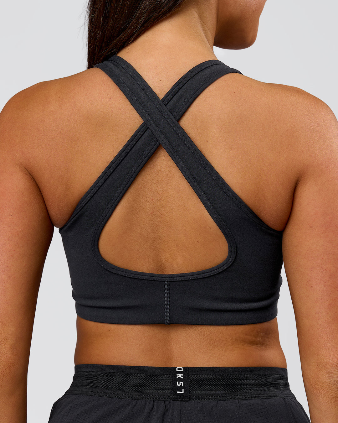 Woman wearing Stamina Amplify Sports Bra - Black | Model:Bianca | Size:S - view 4