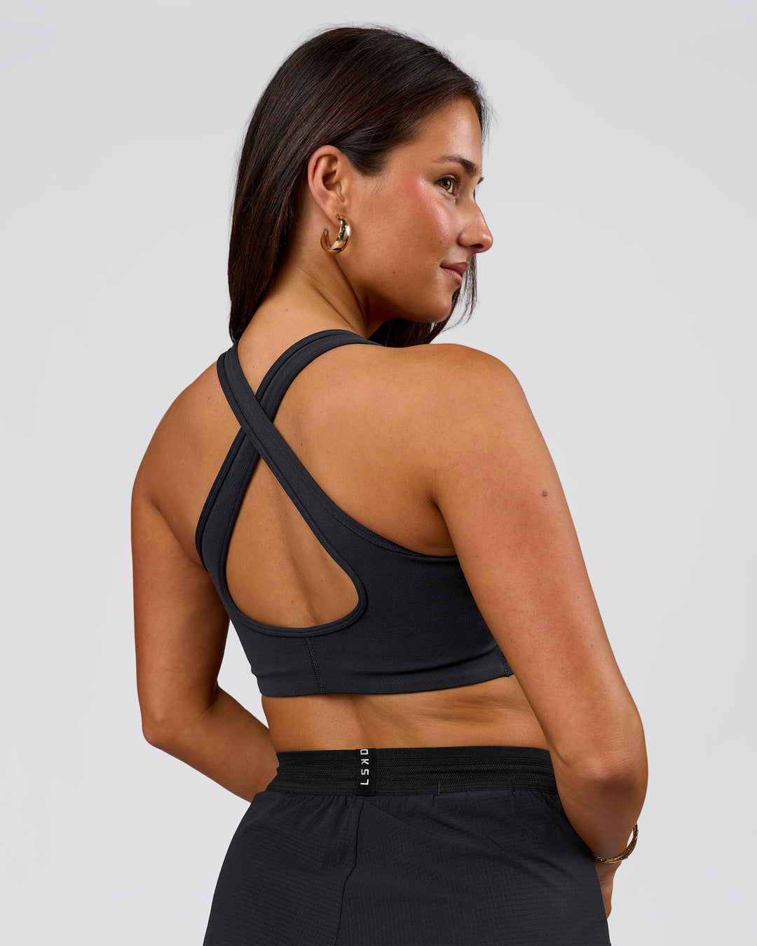 Woman wearing Stamina Amplify Sports Bra - Black | Model:Bianca | Size:S - view 9
