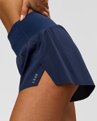 Woman wearing Tia-Clair Toomey-Orr Accelerate 3" Storage Running Short - Future Navy | Model:Bianca | Size:S | Thumbnail Index: 1