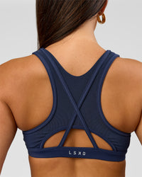 Woman wearing Unstoppable Racerback Sports Bra - Future Navy | Model:Bianca | Size:S | Thumbnail Index: 9