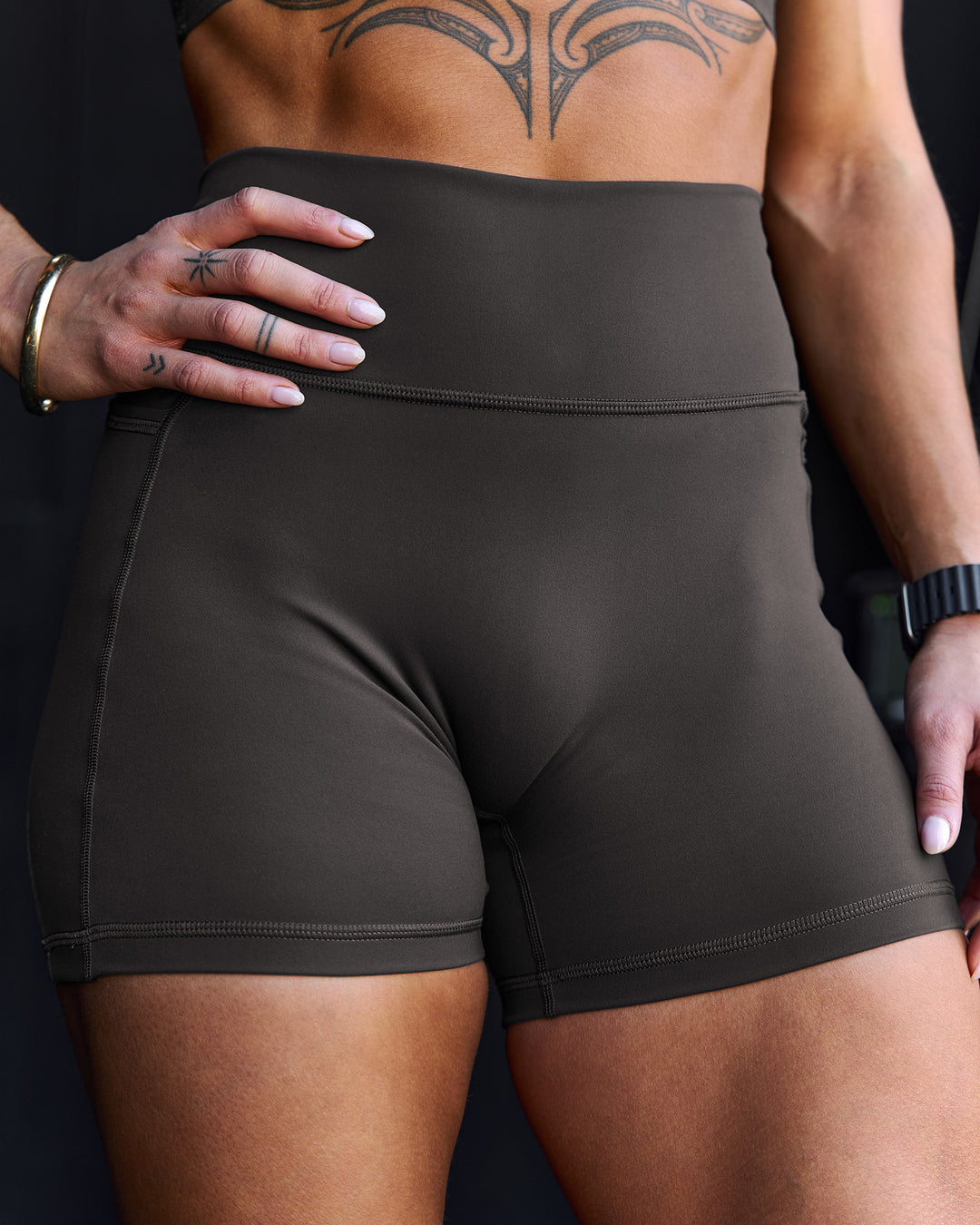 Woman wearing Fusion Ultra High-Rise 4" Short Pockets - Onyx | Model:Chelsea | Size:S - view 11