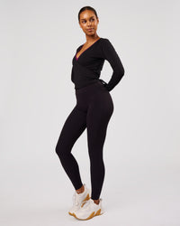 Woman wearing All Day Wrap FLXCotton Long Sleeve Top - Black | Model:Jordan | Size:S | Thumbnail Index: 6