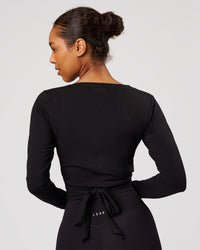 Woman wearing All Day Wrap FLXCotton Long Sleeve Top - Black | Model:Jordan | Size:S | Thumbnail Index: 3