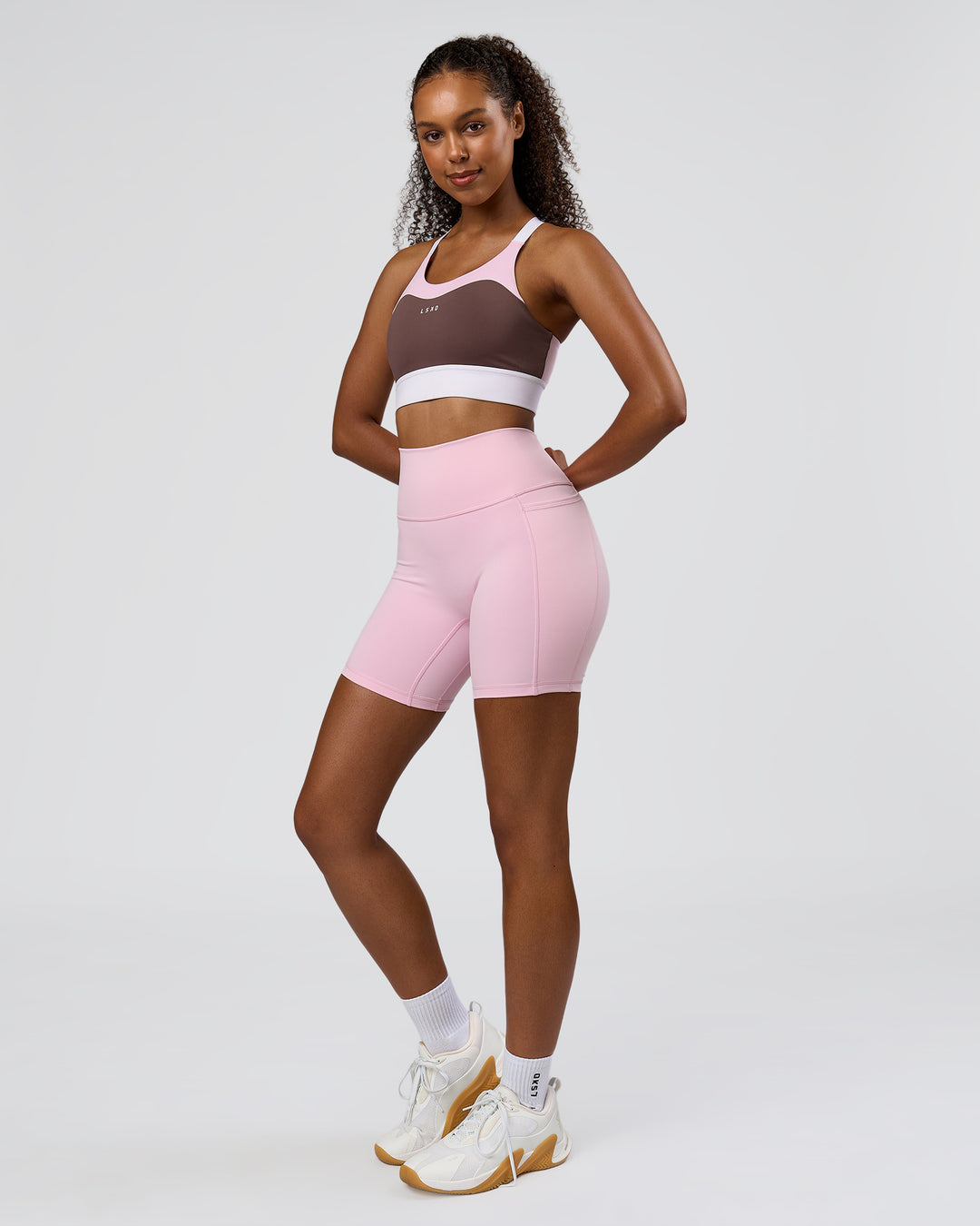 Woman wearing Elevated Accelerate Sports Bra - Cocoa Powder-Marshmallow-White | Model:Jordan | Size:S - view 5