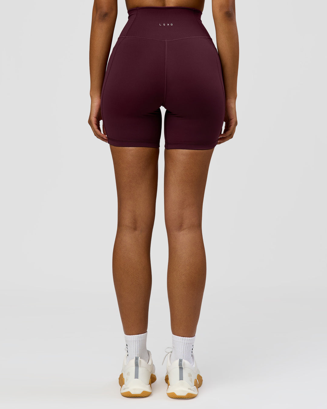 Woman wearing Fusion Ultra High-Rise 6" Short Pockets - Cherry Lacquer | Model:Jordan | Size:S - view 8