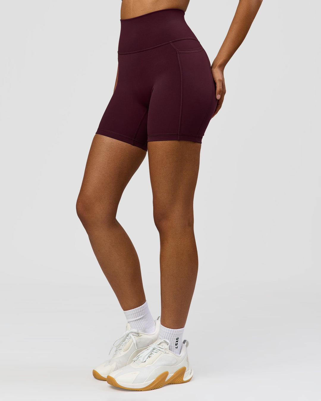Woman wearing Fusion Ultra High-Rise 6" Short Pockets - Cherry Lacquer | Model:Jordan | Size:S - view 9