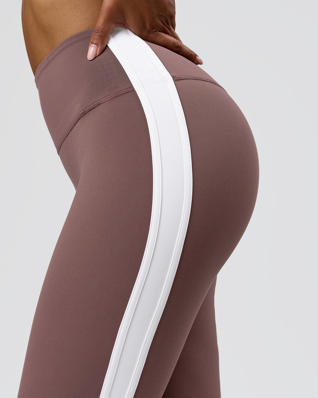Woman wearing Fusion V-Contour Bind High-Rise Flared Legging - Cocoa Power-White | Model:Jordan | Size:S - view 7