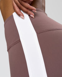 Woman wearing Fusion V-Contour Bind High-Rise Flared Legging - Cocoa Power-White | Model:Jordan | Size:S | Thumbnail Index: 9