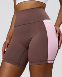 Woman wearing Fusion V-Contour Ultra High-Rise 4" Short Pockets - Cocoa Powder-Marshmallow-White | Model:Jordan | Size:S | Thumbnail Index: 2
