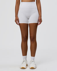 Woman wearing Fusion V-Contour Ultra High-Rise 4" Short Pockets - White | Model:Jordan | Size:S | Thumbnail Index: 5