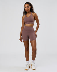 Woman wearing Fusion V-Contour Ultra High-Rise 6" Short Pockets - Cocoa Powder | Model:Jordan | Size:S | Thumbnail Index: 6