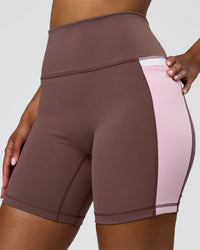 Woman wearing Fusion V-Contour Ultra High-Rise 6" Short Pockets - Cocoa Powder-Marshmallow-White | Model:Jordan | Size:S | Thumbnail Index: 1