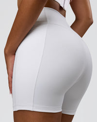 Woman wearing Fusion V-Contour Ultra High-Rise 6" Short Pockets - White | Model:Jordan | Size:S | Thumbnail Index: 3