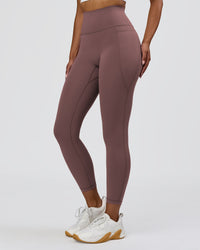 Woman wearing Fusion V-Contour Ultra High-Rise 7/8 Legging Pockets - Cocoa Powder | Model:Jordan | Size:S | Thumbnail Index: 0