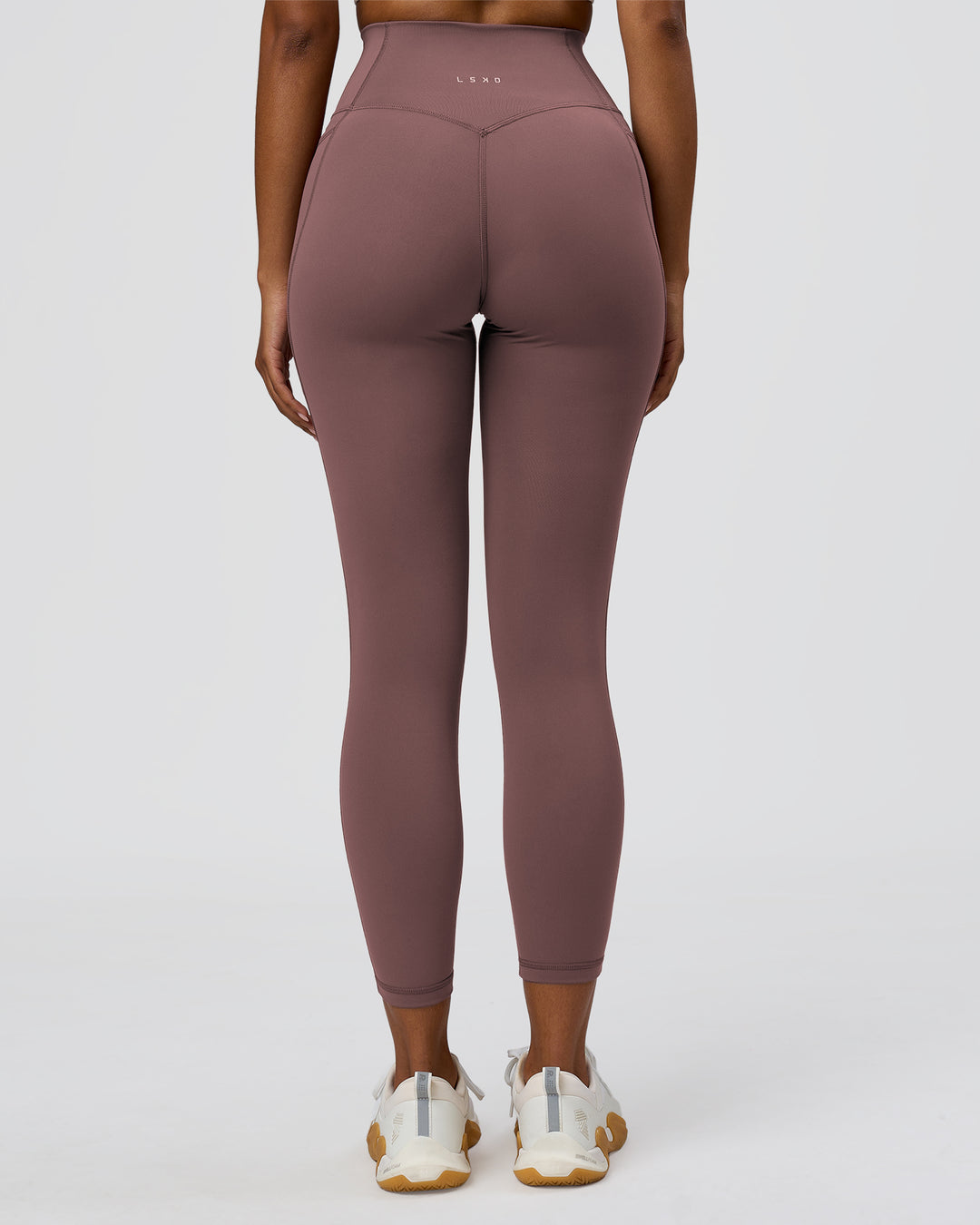 Woman wearing Fusion V-Contour Ultra High-Rise 7/8 Legging Pockets - Cocoa Powder | Model:Jordan | Size:S - view 2
