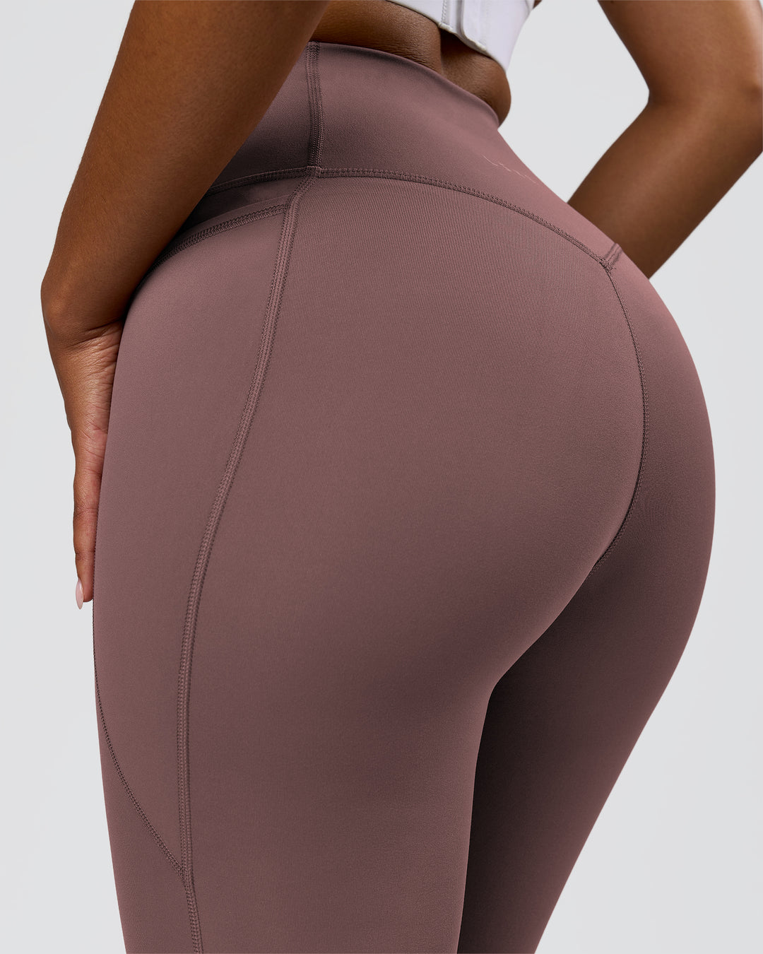 Woman wearing Fusion V-Contour Ultra High-Rise 7/8 Legging Pockets - Cocoa Powder | Model:Jordan | Size:S - view 7