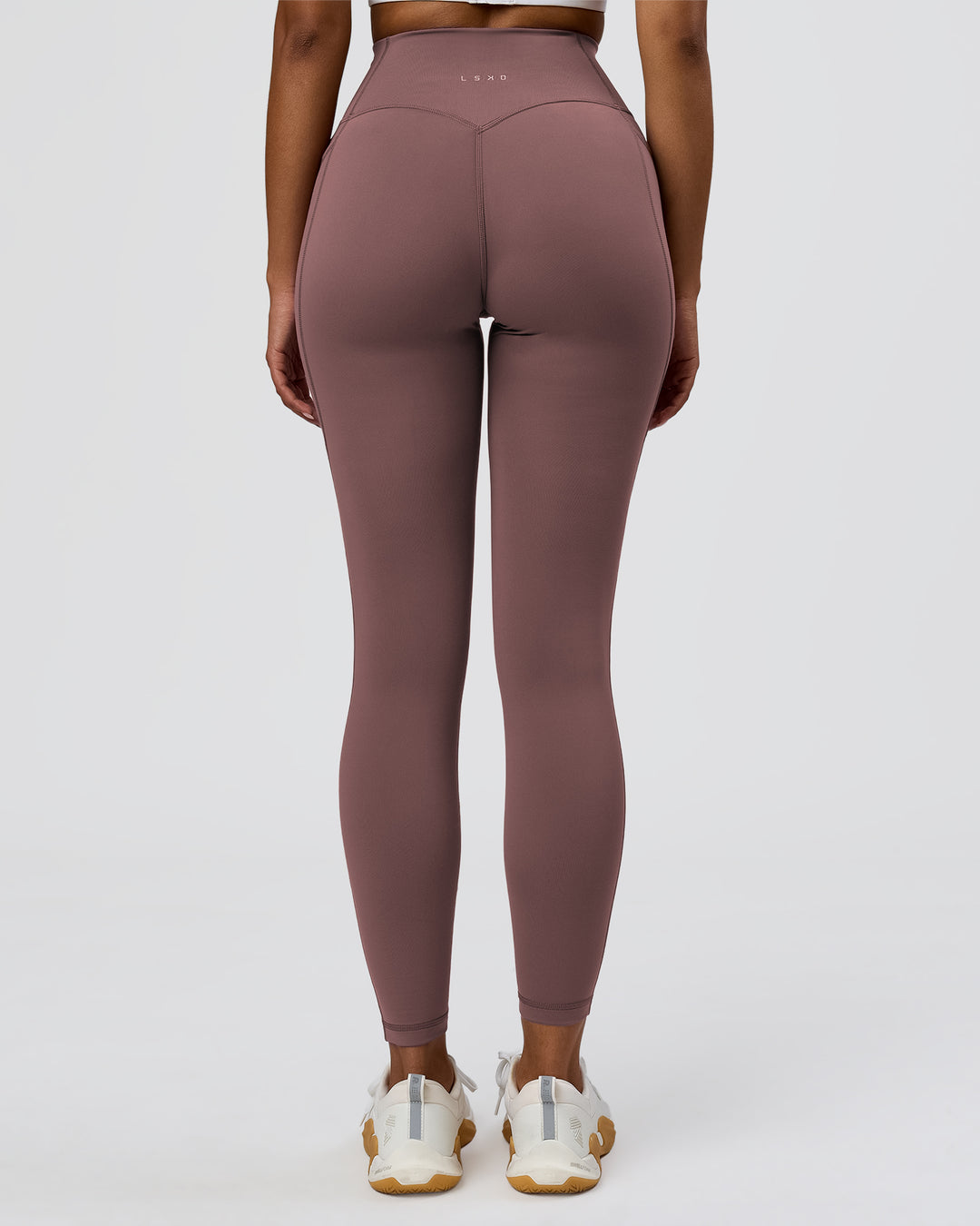 Woman wearing Fusion V-Contour Ultra High-Rise Full Length Legging Pockets - Cocoa Powder | Model:Jordan | Size:S - view 1