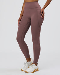 Woman wearing Fusion V-Contour Ultra High-Rise Full Length Legging Pockets - Cocoa Powder | Model:Jordan | Size:S | Thumbnail Index: 2