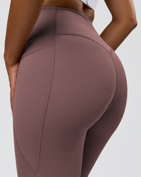 Woman wearing Fusion V-Contour Ultra High-Rise Full Length Legging Pockets - Cocoa Powder | Model:Jordan | Size:S | Thumbnail Index: 5