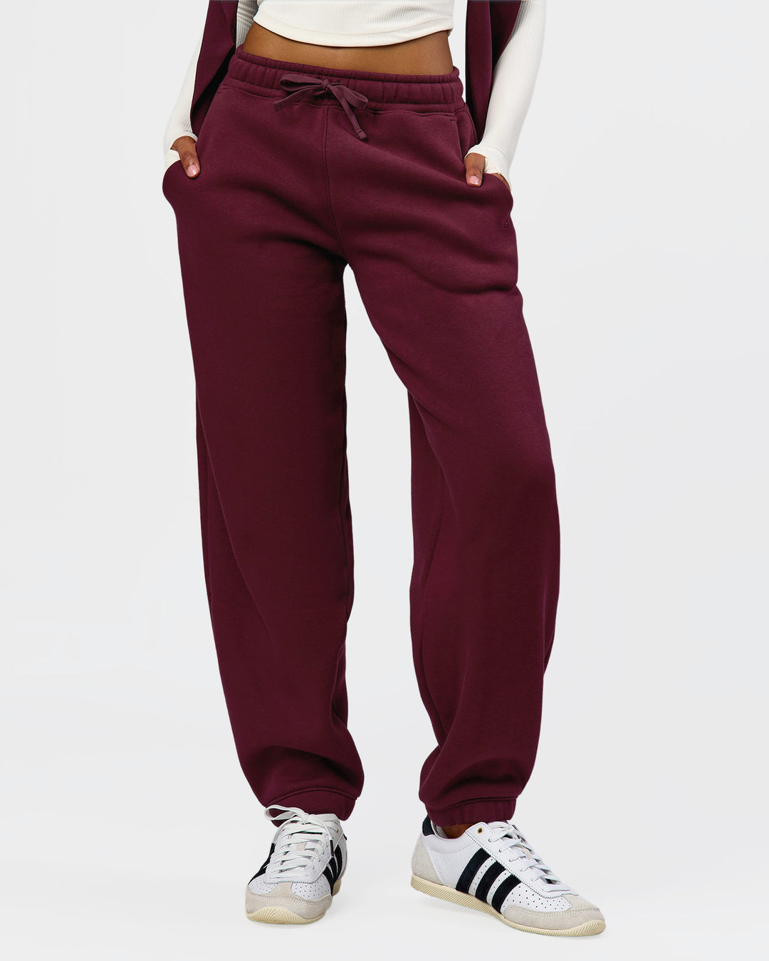 Woman wearing Go-To Oversized Track Pant - Cherry Lacquer | Model:Jordan | Size:S - view 1