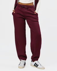 Woman wearing Go-To Oversized Track Pant - Cherry Lacquer | Model:Jordan | Size:S | Thumbnail Index: 0