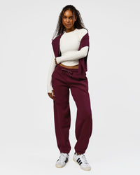Woman wearing Go-To Oversized Track Pant - Cherry Lacquer | Model:Jordan | Size:S | Thumbnail Index: 4