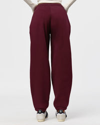 Woman wearing Go-To Oversized Track Pant - Cherry Lacquer | Model:Jordan | Size:S | Thumbnail Index: 5