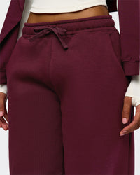 Woman wearing Go-To Oversized Track Pant - Cherry Lacquer | Model:Jordan | Size:S | Thumbnail Index: 6